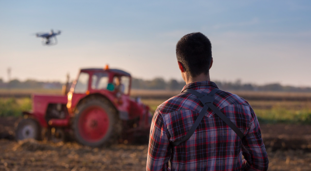 Farmer using a drone to review crops